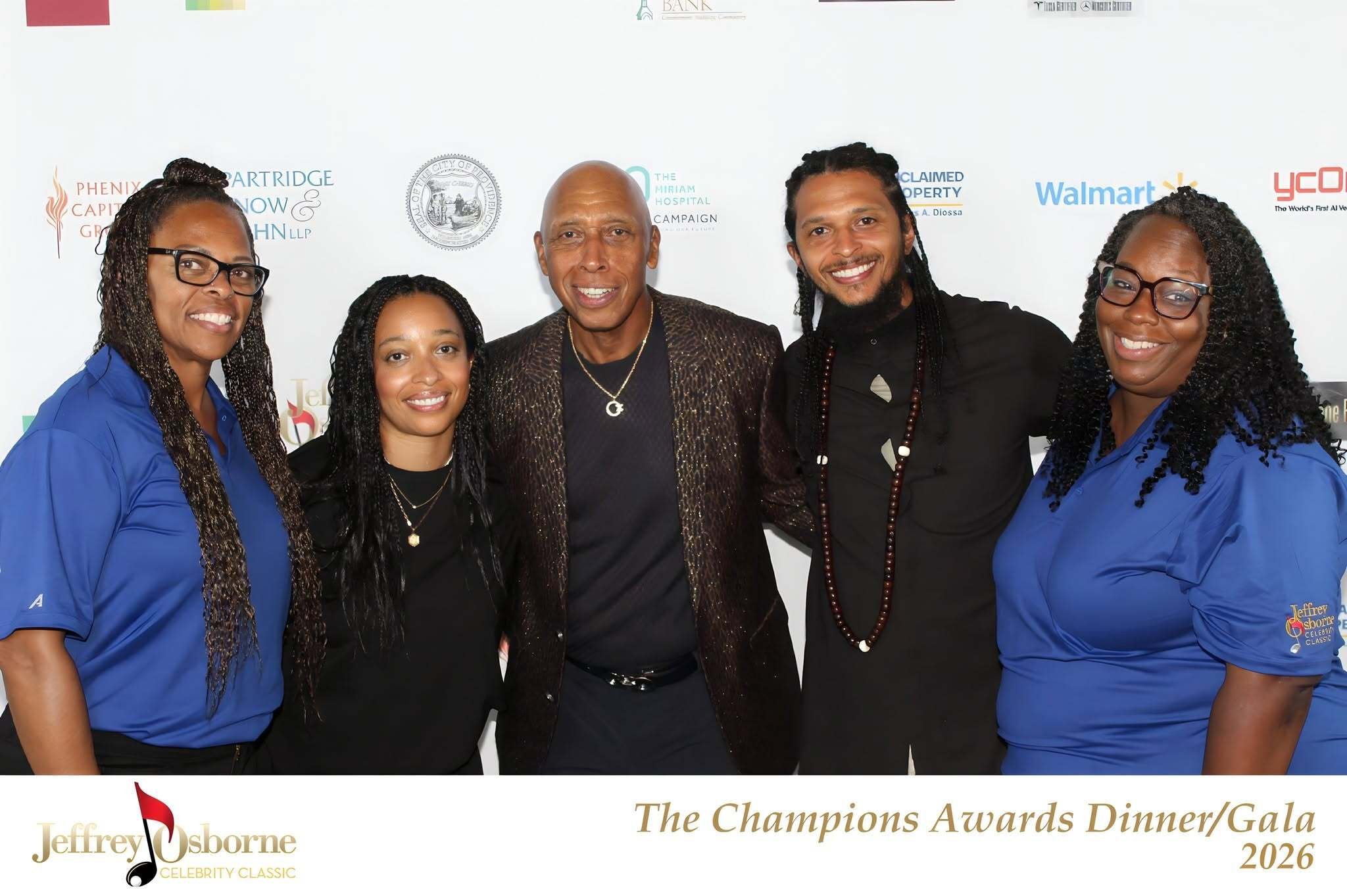 Guests and Jeffrey Osborne  enjoying the TapSnap photo booth at the Jeffrey Osborne Celebrity Classic Welcome Reception