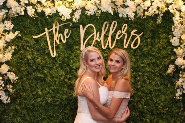 bride with plant wall